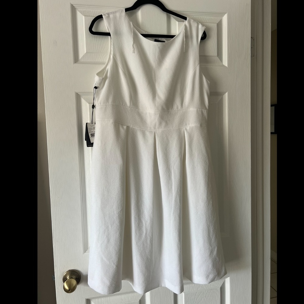 White fit and flare dress with back keyhole.